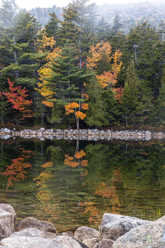 There was no wind so the reflections were clear in Jordan Pond. [J35R2319]