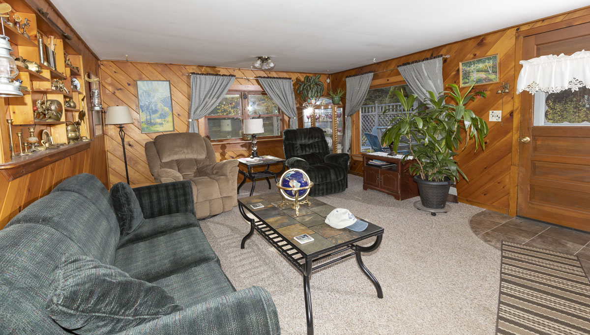 The large living room in the cottage. A 55" TV is out of the frame to the right. Spectrum 100 Mbs internet is provided. [R20R2774]