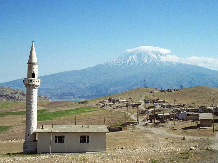 Mount Ararat covered in clouds as viewed from the little village near the site of Noah's Ark.