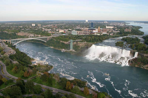 Rainbow Bridge connecting US and Canada and the American Falls from the Skylon tower.