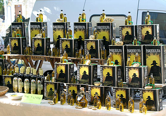 Lots of olive oil for sale. The large five liter (1.32 gallons) cans were 27 euros ($34 or about $13 per quart).