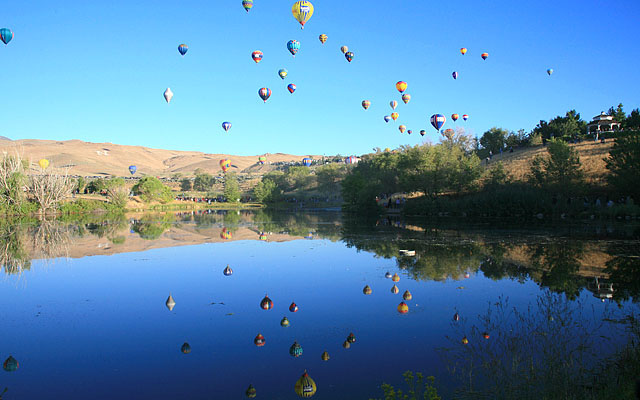 Evans Pond near the launch field lets you see twice as many balloons.
