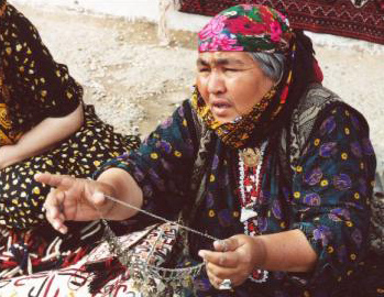 Woman offering necklace